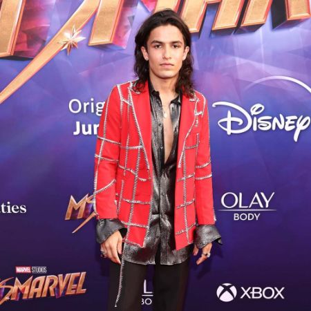 Aramis Knight wears a suit for an event